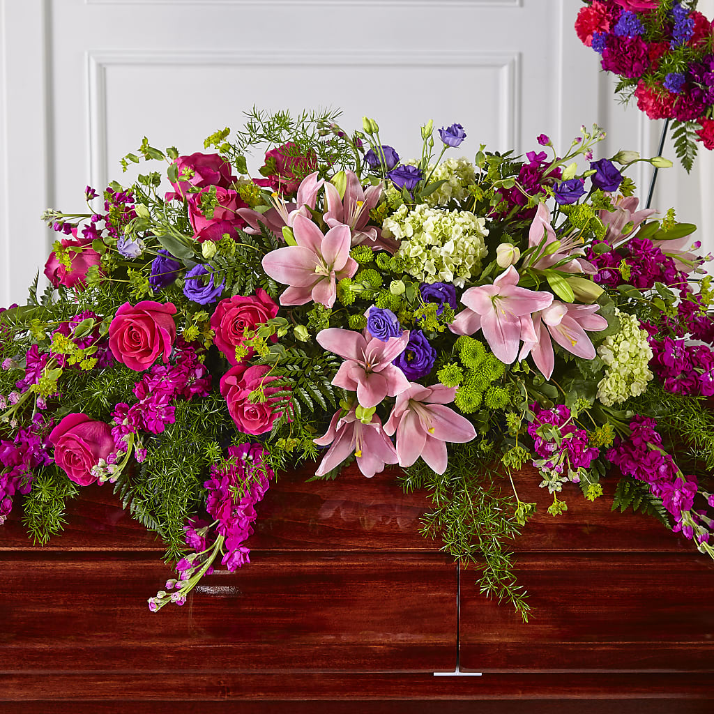 Radiant Tribute Casket Spray – Facet Flowers, Austin TX