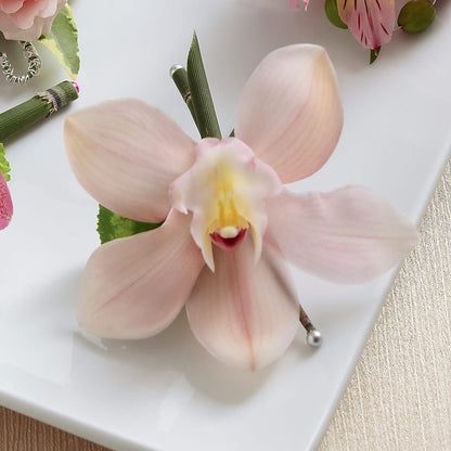 Pink Cymbidium Boutonniere –  Facet Flowers, Austin TX